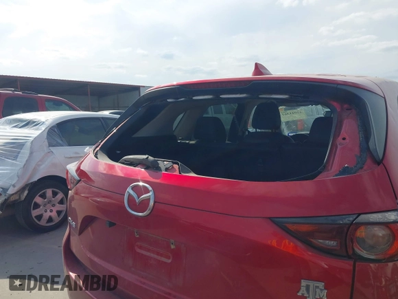 2017 Mazda CX-5 Touring with VIN JM3KFACL3H0195212, listed as a IAAI auction lot 42041361 with 57,377 mi miles and . Bid and sale history available at carsss.com. Image 6.
