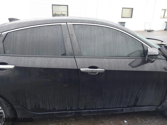 2017 Honda Civic Sedan Touring with VIN 2HGFC1F99HH658034, listed as a IAAI auction lot 41563627 with 140,819 mi miles. Bid and sale history available at carsss.com. Image 13.