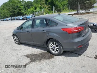 2017 Ford Focus SE with VIN 1FADP3F2XHL201380, listed as a Copart auction lot 56942815 with 136,169 mi miles and Salvage title. Bid and sale history available at DreamBid. Image 2.