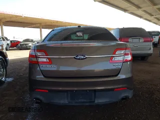 2015 Ford Taurus SEL with VIN 1FAHP2H87FG176103, listed as a IAAI auction lot 41950844 with 205,014 mi miles. Bid and sale history available at carsss.com. Image 16.