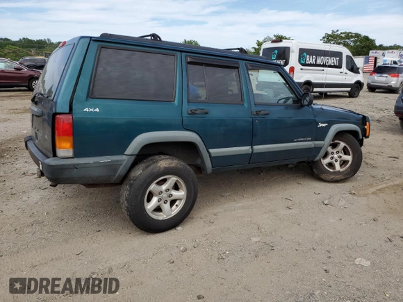 1998 Jeep Cherokee Sport z VIN 1J4FJ68S4WL101110, wystawiony jako Copart lot #57696755 z przebiegiem 218 254 mil mil oraz Szkoda całkowita • Salvage title. Historia ofert i sprzedaży dostępna na DreamBid. Obrazek 3.