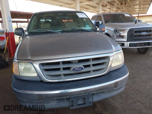 2003 Ford F-150 XLT with VIN 1FTRW07693KA29179, listed as a IAAI auction lot 41726462 with 191,365 mi miles. Bid and sale history available at carsss.com. Image 6.