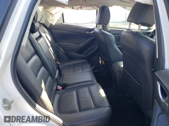 2014 Mazda CX-5 Grand Touring with VIN JM3KE4DY6E0376413, listed as a Copart auction lot 53204935 with 126,791 mi miles and Salvage Title. Bid and sale history available at DreamBid. Image 11.
