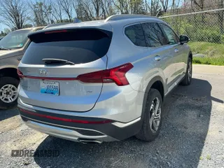 2021 Hyundai Santa Fe SEL with VIN 5NMS6DAJ4MH357435, listed as a IAAI auction lot 42143138 with 57,363 mi miles. Bid and sale history available at carsss.com. Image 1.