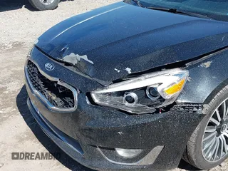 2014 Kia Cadenza Premium with VIN KNALN4D73E5140435, listed as a IAAI auction lot 41843037 with 126,555 mi miles and . Bid and sale history available at DreamBid. Image 6.