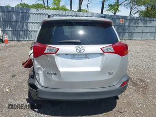 2013 Toyota RAV4 XLE with VIN JTMRFREV6DD011338, listed as a IAAI auction lot 42214088 with 202,537 mi miles and . Bid and sale history available at DreamBid. Image 16.