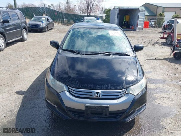 2010 Honda Insight LX with VIN JHMZE2H53AS031218, listed as a IAAI auction lot 41738562 with 96808 miles. Bid and sale history available at carsss.com. Image 11.