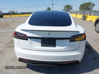 2023 Tesla Model S with VIN 5YJSA1E59PF500816, listed as a IAAI auction lot 42409049 with Not provided miles and . Bid and sale history available at DreamBid. Image 16.