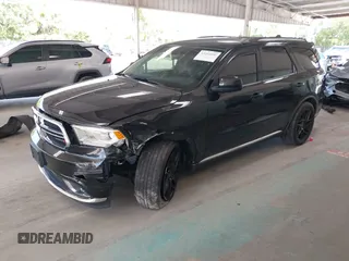 2016 Dodge Durango SXT with VIN 1C4RDHAG3GC301666, listed as a IAAI auction lot 42264091 with 100,769 mi miles and . Bid and sale history available at DreamBid. Image 2.