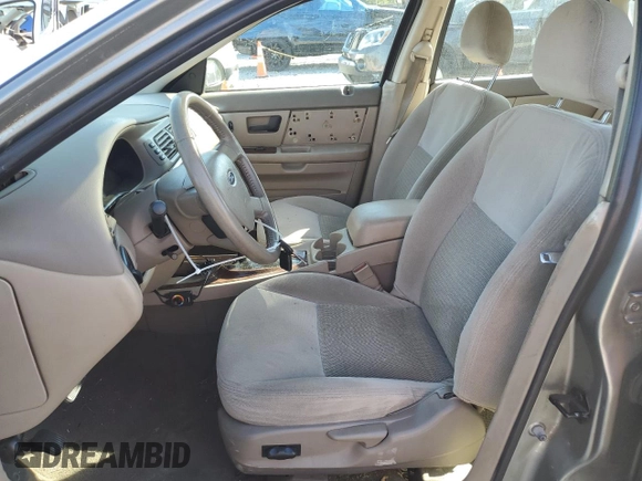 2004 Ford Taurus SEL with VIN 1FAFP56S94A112961, listed as a Copart auction lot 75905854 with 138,721 mi miles and Salvage Title. Bid and sale history available at DreamBid. Image 7.