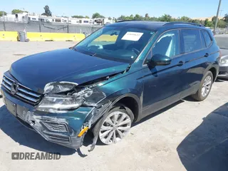 2018 Volkswagen Tiguan S with VIN 3VV1B7AX1JM165641, listed as a IAAI auction lot 42699622 with 75,354 mi miles and . Bid and sale history available at DreamBid. Image 16.