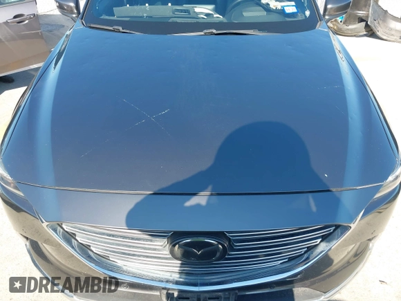 2020 Mazda CX-9 Grand Touring with VIN JM3TCADY1L0417651, listed as a IAAI auction lot 42334867 with 105,236 mi miles and . Bid and sale history available at DreamBid. Image 6.