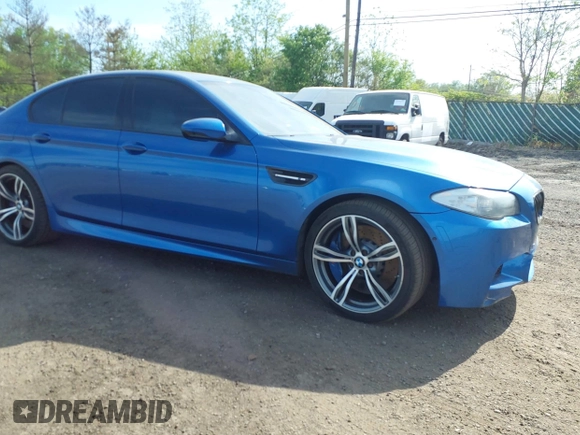 2013 BMW M5 with VIN WBSFV9C56DC774032, listed as a IAAI auction lot 42124754 with 55,409 mi miles. Bid and sale history available at carsss.com. Image 6.