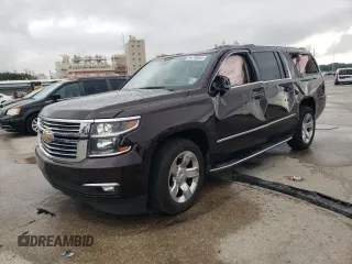 2020 Chevrolet Suburban Premier with VIN 1GNSCJKC7LR210387, listed as a Copart auction lot 64700645 with Not provided miles and Salvage title. Bid and sale history available at DreamBid. Image 1.