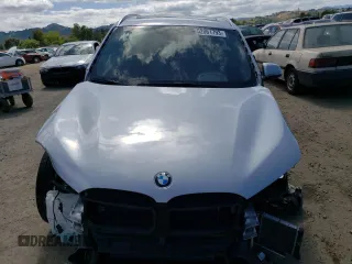 2018 BMW X1 sDrive28i with VIN WBXHU7C38J3H42948, listed as a Copart auction lot 52061793 with 26,991 mi miles. Bid and sale history available at carsss.com. Image 5.