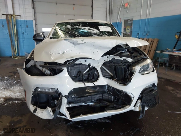 2019 BMW X4 xDrive30i with VIN 5UXUJ3C56KLG56553, listed as a IAAI auction lot 41365333 with 77,727 mi miles. Bid and sale history available at carsss.com. Image 13.