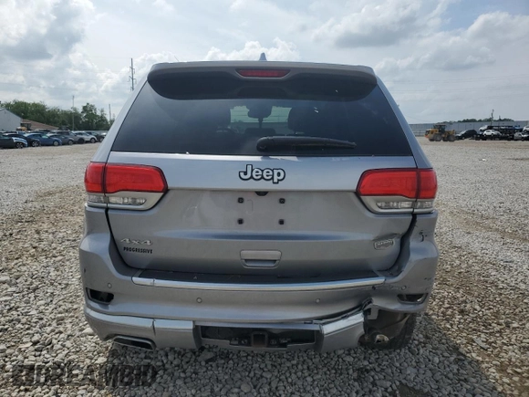 2019 Jeep Grand Cherokee Summit with VIN 1C4RJFJT3KC762191, listed as a Copart auction lot 60040685 with 98,200 mi miles and Salvage title. Bid and sale history available at DreamBid. Image 6.
