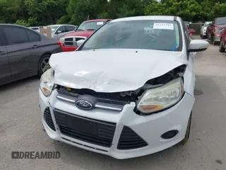 2014 Ford Focus SE with VIN 1FADP3K24EL209329, listed as a IAAI auction lot 42223749 with 141,196 mi miles and . Bid and sale history available at carsss.com. Image 6.