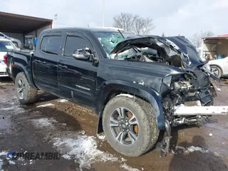 2017 Toyota Tacoma SR5 with VIN 5TFCZ5ANXHX061031, listed as a IAAI auction lot 41218297 with Not Provided miles and . Bid and sale history available at DreamBid. Image 1.
