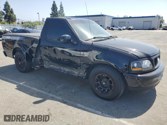 1998 Ford F-150 with VIN 1FTYF1764WNC18357, listed as a Copart auction lot 62138625 with 144,879 mi miles and Salvage title. Bid and sale history available at DreamBid. Image 4.