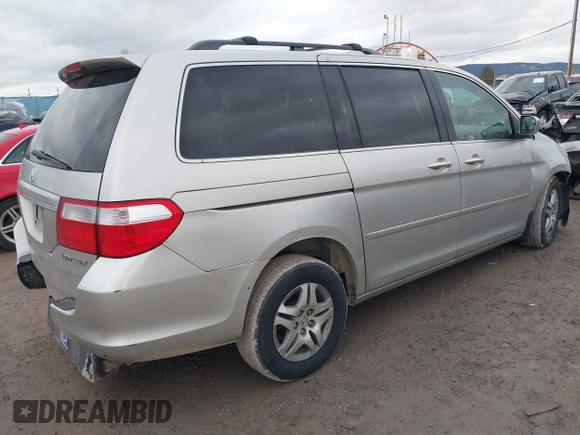 2005 Honda Odyssey EX-L with VIN 5FNRL38675B505695, listed as a IAAI auction lot 40931430 with 337,403 mi miles. Bid and sale history available at carsss.com. Image 4.