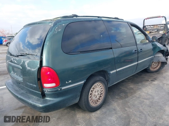 1997 Chrysler Town & Country LXi with VIN 1C4GP54L1VB213059, listed as a IAAI auction lot 39378181 with 1 mi miles. Bid and sale history available at carsss.com. Image 4.