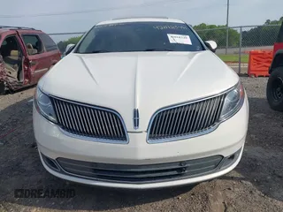 2013 Lincoln MKS EcoBoost with VIN 1LNHL9FT3DG605011, listed as a IAAI auction lot 42018348 with 110,701 mi miles and . Bid and sale history available at DreamBid. Image 6.