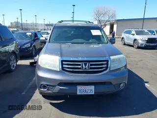2014 Honda Pilot EX-L with VIN 5FNYF3H52EB015806, listed as a IAAI auction lot 41676586 with 193,215 mi miles and . Bid and sale history available at carsss.com. Image 13.