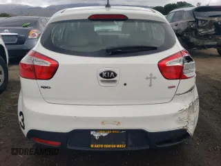2014 Kia Rio LX with VIN KNADM5A34E6377346, listed as a Copart auction lot 82783993 with 107,160 mi miles and Salvage Title. Bid and sale history available at carsss.com. Image 6.