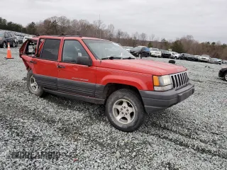 1998 Jeep Grand Cherokee Laredo with VIN 1J4GZ58S6WC104114, listed as a Copart auction lot 84232604 with 0 mi miles and Salvage Title. Bid and sale history available at carsss.com. Image 4.