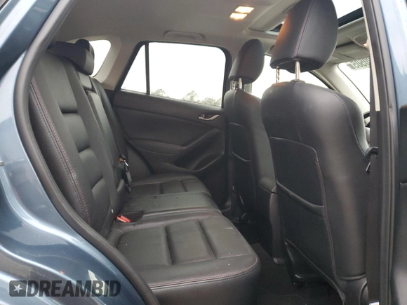 2015 Mazda CX-5 Grand Touring with VIN JM3KE2DY4F0526671, listed as a Copart auction lot 46520505 with 129,017 mi miles and Salvage Title. Bid and sale history available at carsss.com. Image 11.