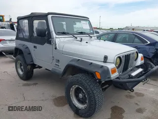 2005 Jeep Wrangler X z VIN 1J4FA39S95P370868, wystawiony jako IAAI lot #42476186 z przebiegiem 144 986 mil mil oraz . Historia ofert i sprzedaży dostępna na DreamBid. Obrazek 1.