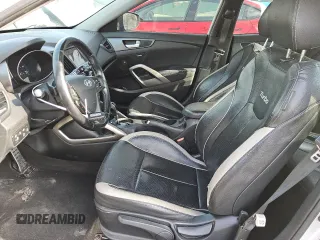 2014 Hyundai Veloster Turbo with VIN KMHTC6AE0EU211034, listed as a Copart auction lot 49711635 with 126,394 mi miles and Clean title. Bid and sale history available at DreamBid. Image 7.