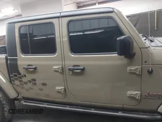 2020 Jeep Gladiator Rubicon z VIN 1C6JJTBGXLL178893, wystawiony jako IAAI lot #42206863 z przebiegiem 29 138 mil mil oraz . Historia ofert i sprzedaży dostępna na DreamBid. Obrazek 14.