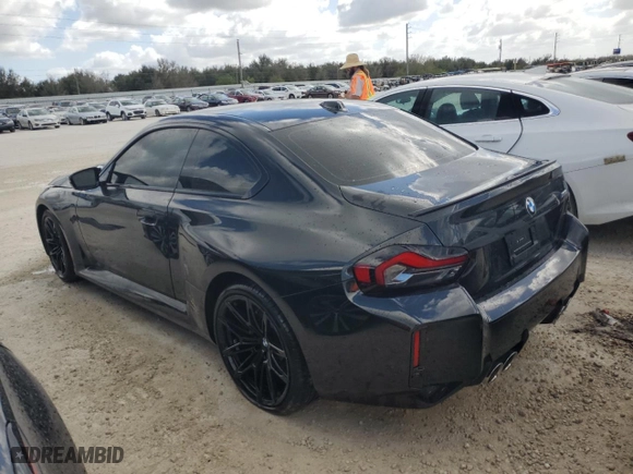 2023 BMW M2 with VIN 3MF13DM07P8D63938, listed as a Copart auction lot 77996634 with 8,571 mi miles and Salvage Title. Bid and sale history available at carsss.com. Image 2.