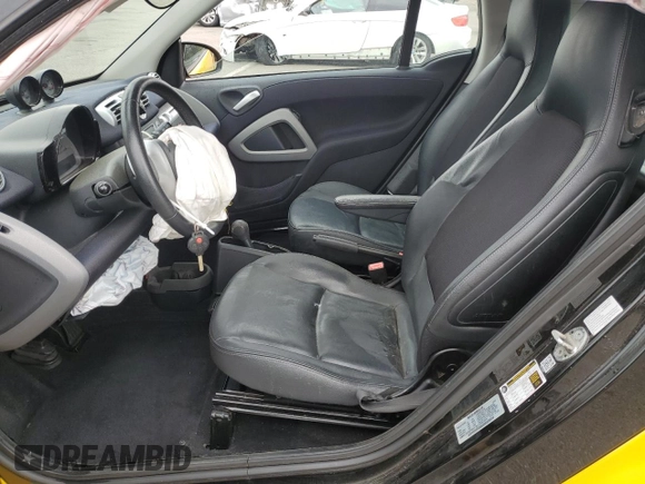2015 Smart fortwo Passion with VIN WMEEJ9AA5FK831751, listed as a Copart auction lot 58025575 with 55,512 mi miles and Salvage title. Bid and sale history available at DreamBid. Image 7.