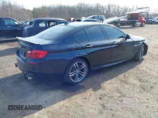 2013 BMW 5 Series 535i xDrive with VIN WBAFU7C50DDU77411, listed as a IAAI auction lot 41796299 with 138,944 mi miles and . Bid and sale history available at carsss.com. Image 4.