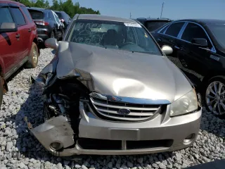2006 Kia Spectra EX z VIN KNAFE121265353582, wystawiony jako Copart lot #52747635 z przebiegiem 99 087 mil mil oraz Szkoda całkowita • Salvage title. Historia ofert i sprzedaży dostępna na DreamBid. Obrazek 5.