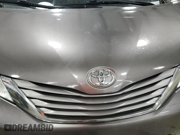 2015 Toyota Sienna XLE с VIN 5TDYK3DC4FS650605, выставлен на аукционе Copart как лот 58217575 с пробегом 174 364 миль миль и Списание • Salvage title. История ставок и продаж доступна на DreamBid. Изображение 12.