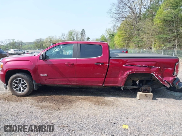 2019 GMC Canyon 4WD All Terrain z VIN 1GTG6FEN1K1290802, wystawiony jako IAAI lot #42150541 z przebiegiem 41 296 mil mil oraz . Historia ofert i sprzedaży dostępna na DreamBid. Obrazek 15.