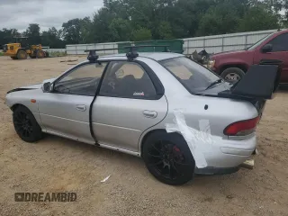 1995 Subaru Impreza with VIN GC8030988, listed as a Copart auction lot 70242354 with 123,696 mi miles and Salvage title. Bid and sale history available at DreamBid. Image 2.