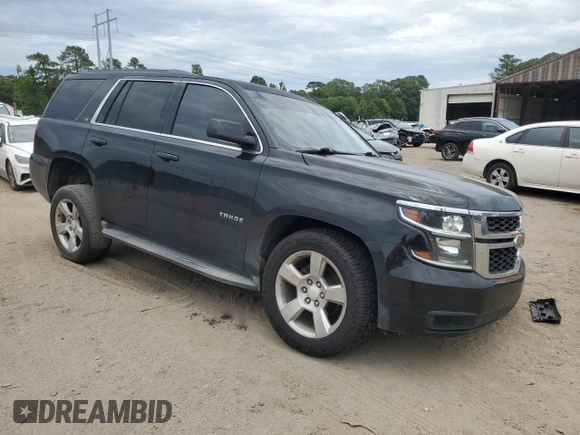 2015 Chevrolet Tahoe LS with VIN 1GNSCAKC5FR308614, listed as a Copart auction lot 60138355 with 145,797 mi miles and Salvage title. Bid and sale history available at DreamBid. Image 4.