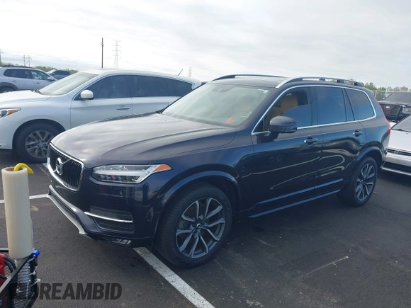 2016 Volvo XC90 T6 Momentum with VIN YV4A22PKXG1045546, listed as a IAAI auction lot 41928078 with 136,790 mi miles. Bid and sale history available at carsss.com. Image 2.