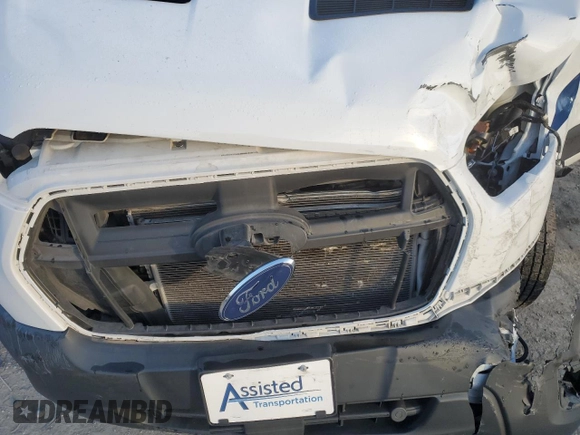 2020 Ford Transit z VIN 1FMZK1C87LKB11433, wystawiony jako Copart lot #85380574 z przebiegiem Nie podano mil oraz Szkoda całkowita • Salvage title. Historia ofert i sprzedaży dostępna na DreamBid. Obrazek 12.