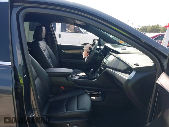 2023 Cadillac XT5 FWD Luxury с VIN 1GYKNAR40PZ193854, выставлен на аукционе IAAI как лот 42422246 с пробегом 26 053 миль миль и . История ставок и продаж доступна на DreamBid. Изображение 5.