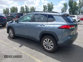 2022 Toyota Corolla Cross LE with VIN 7MUBAAAG1NV004852, listed as a IAAI auction lot 42251301 with 50,197 mi miles and . Bid and sale history available at DreamBid. Image 3.
