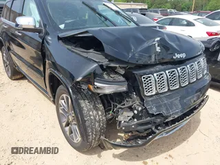 2017 Jeep Grand Cherokee Overland z VIN 1C4RJFCG4HC662884, wystawiony jako IAAI lot #42172826 z przebiegiem 79 305 mil mil oraz . Historia ofert i sprzedaży dostępna na DreamBid. Obrazek 6.
