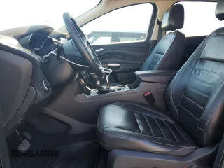 2017 Ford Escape Titanium with VIN 1FMCU0J90HUB04082, listed as a Copart auction lot 77814994 with 135,674 mi miles and Salvage Title. Bid and sale history available at carsss.com. Image 7.