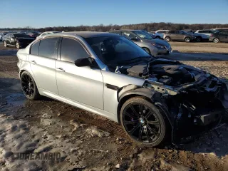 2009 BMW M3 with VIN WBSPM93539E201785, listed as a Copart auction lot 42153135 with 140,557 mi miles and Salvage title. Bid and sale history available at DreamBid. Image 4.