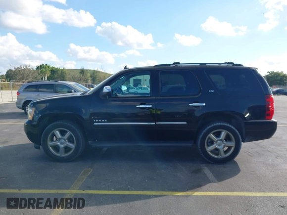 2012 Chevrolet Tahoe LTZ with VIN 1GNSKCE04CR218348, listed as a IAAI auction lot 41541342 with 96,365 mi miles and . Bid and sale history available at DreamBid. Image 14.